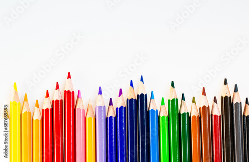 A Vibrant Spectrum of Colorful Pencils Forming a Beautiful Gradient. A row of colored pencils sitting next to each other