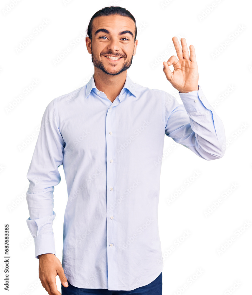 Young handsome man wearing business clothes smiling positive doing ok sign with hand and fingers. successful expression.