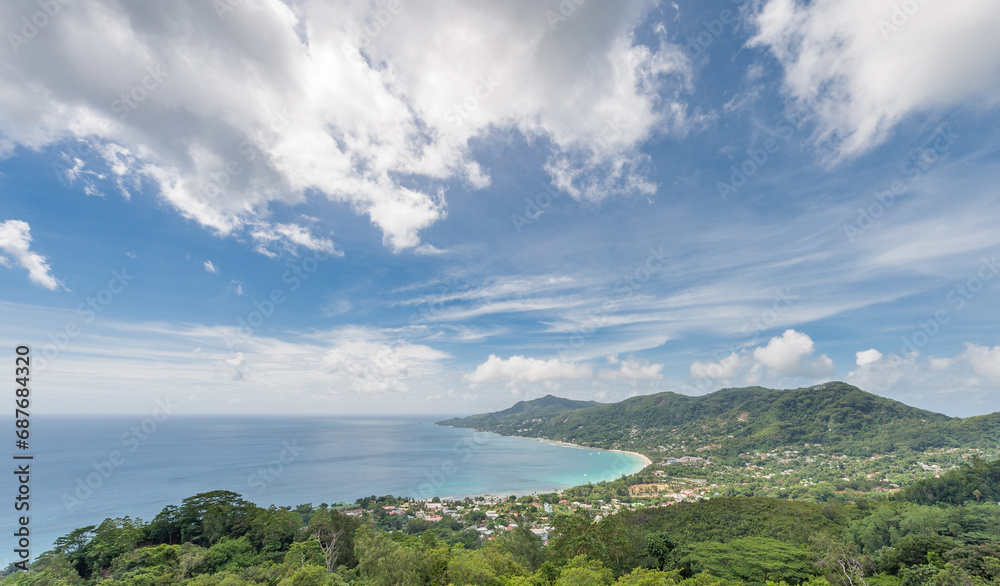 Seychelles Islands with Ocean Water and Blue Sky with Clouds. Landscape.