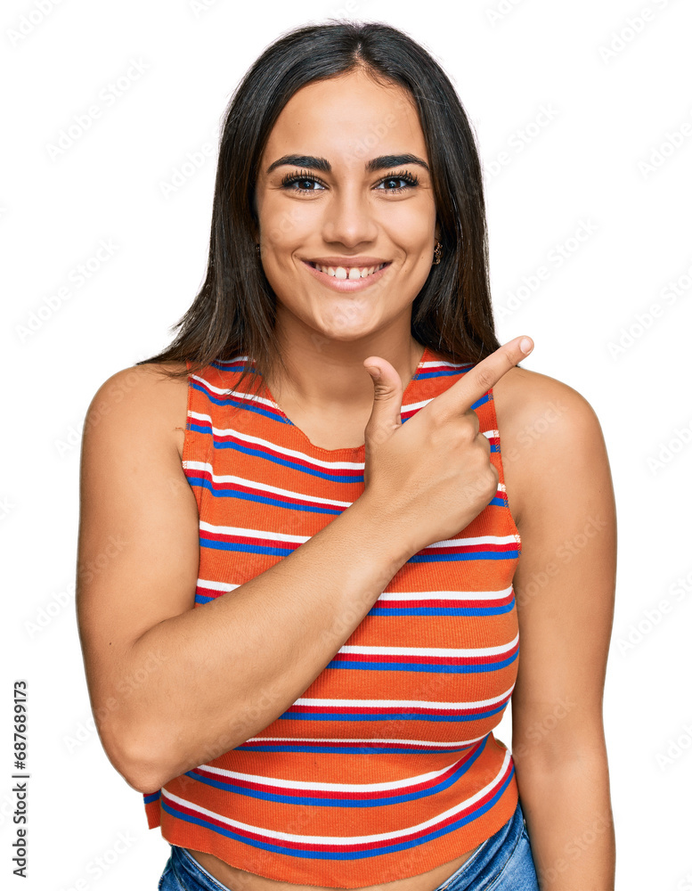 Young brunette woman wearing casual clothes cheerful with a smile of face pointing with hand and finger up to the side with happy and natural expression on face Young brunette woman wearing casual clothes cheerful with a smile of face pointing with hand and finger up to the side with happy and natural expression on face