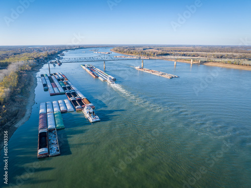towboats and barges on the Ohio River above a confluence with the Mississippi at Cairo, Illinois, aerial view