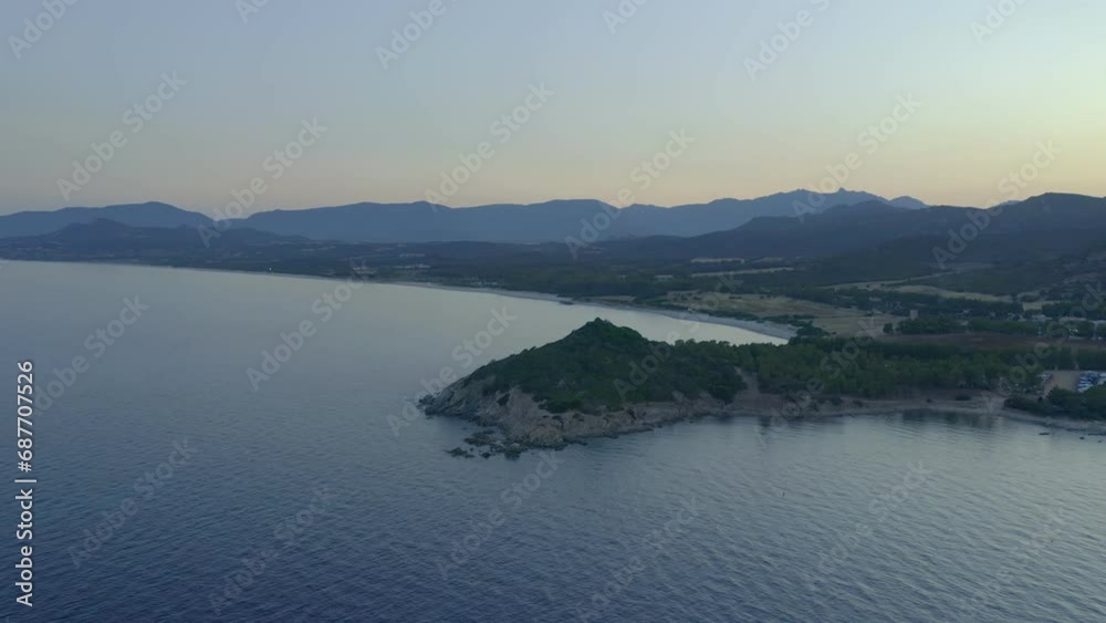 Aerial drone view of coastline of Sardinia in Capo Ferrato cape with white sand beaches and turquoise water at sunset, in Italy Aerial drone view of coastline of Sardinia in Capo Ferrato cape with white sand beaches and turquoise water at sunset, in Italy