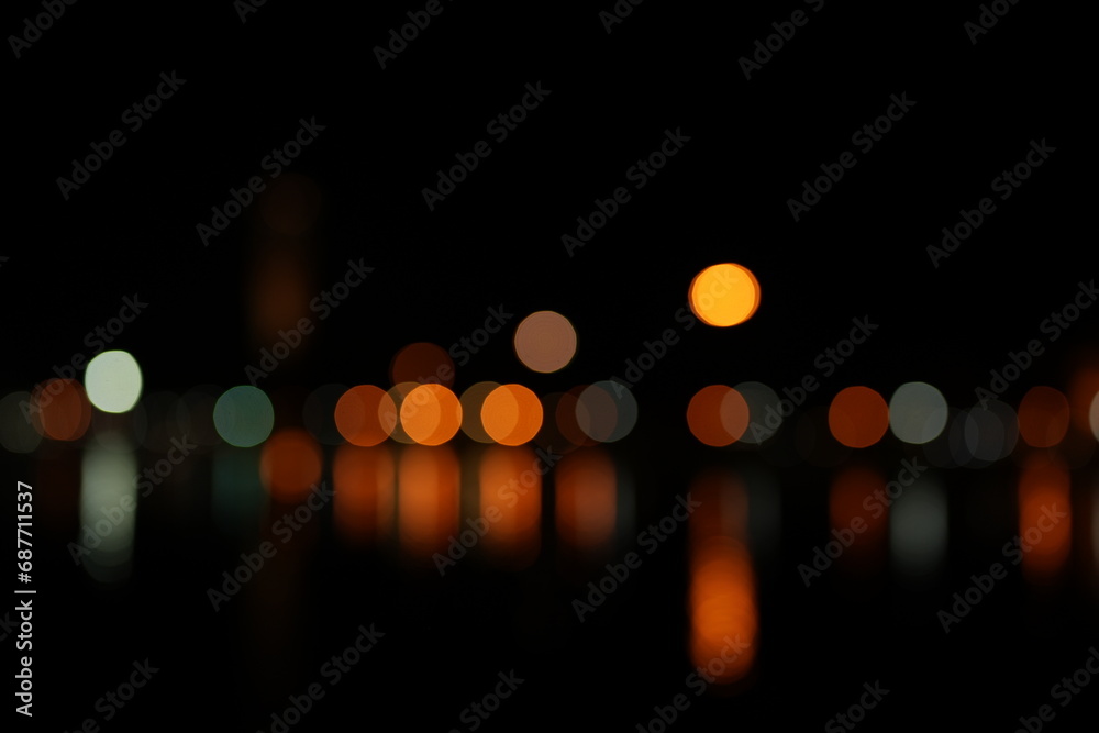 Fototapeta premium Christmas gold background. Golden holiday glowing backdrop. Defocused Background With Blinking Stars. Blurred Bokeh curtain
