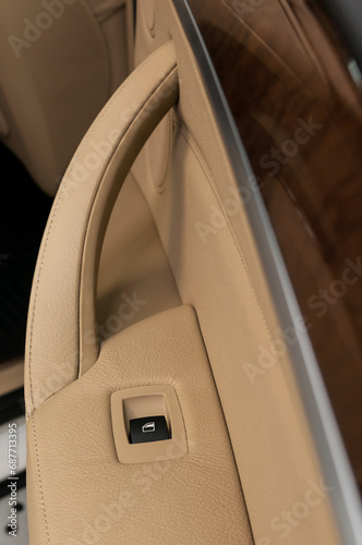Car interior details. Window control buttons.