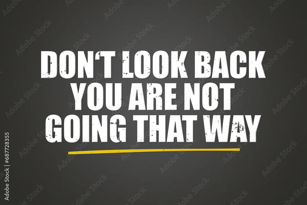 Don't look back you are not going that way. A blackboard with white text. Illustration with grunge text style. Don't look back you are not going that way. A blackboard with white text. Illustration with grunge text style.