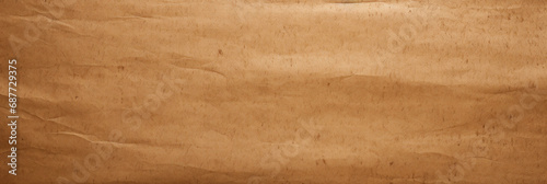 Old brown paper texture background, vintage kraft wrapping sheet wide banner. Rough craft cardboard for packaging or painting. Theme of parchment, recycle, nature and template