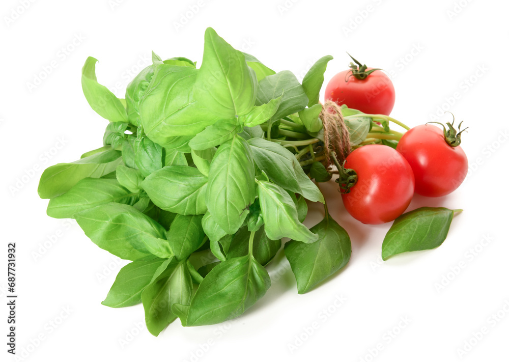 Fresh green basil and tomatoes on white background Fresh green basil and tomatoes on white background