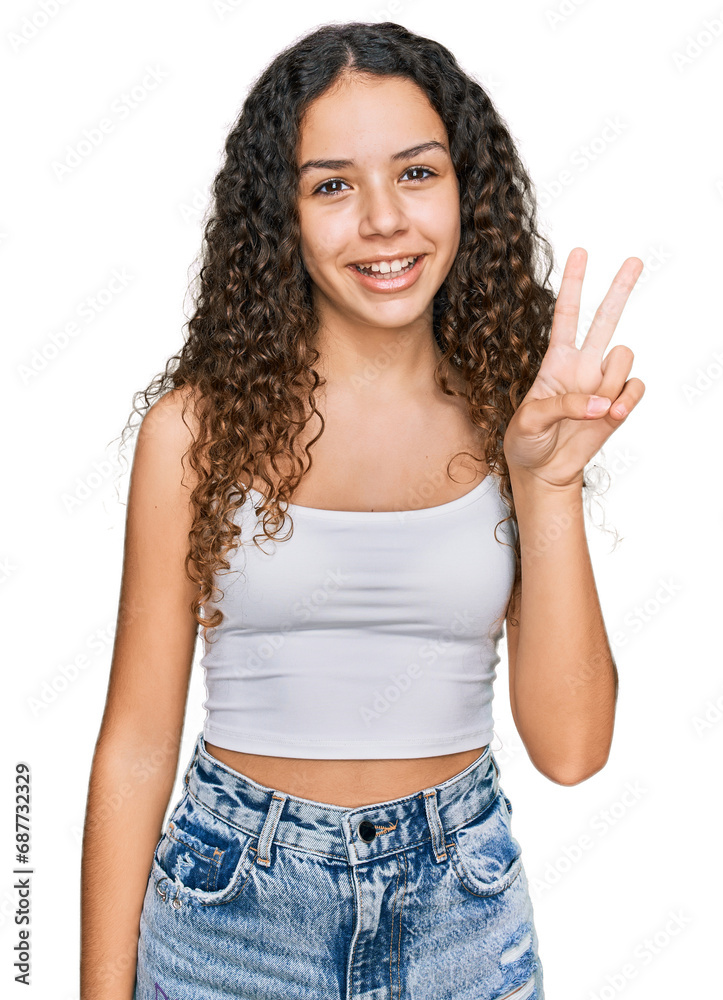 Teenager hispanic girl wearing casual clothes showing and pointing up with fingers number two while smiling confident and happy. Teenager hispanic girl wearing casual clothes showing and pointing up with fingers number two while smiling confident and happy.