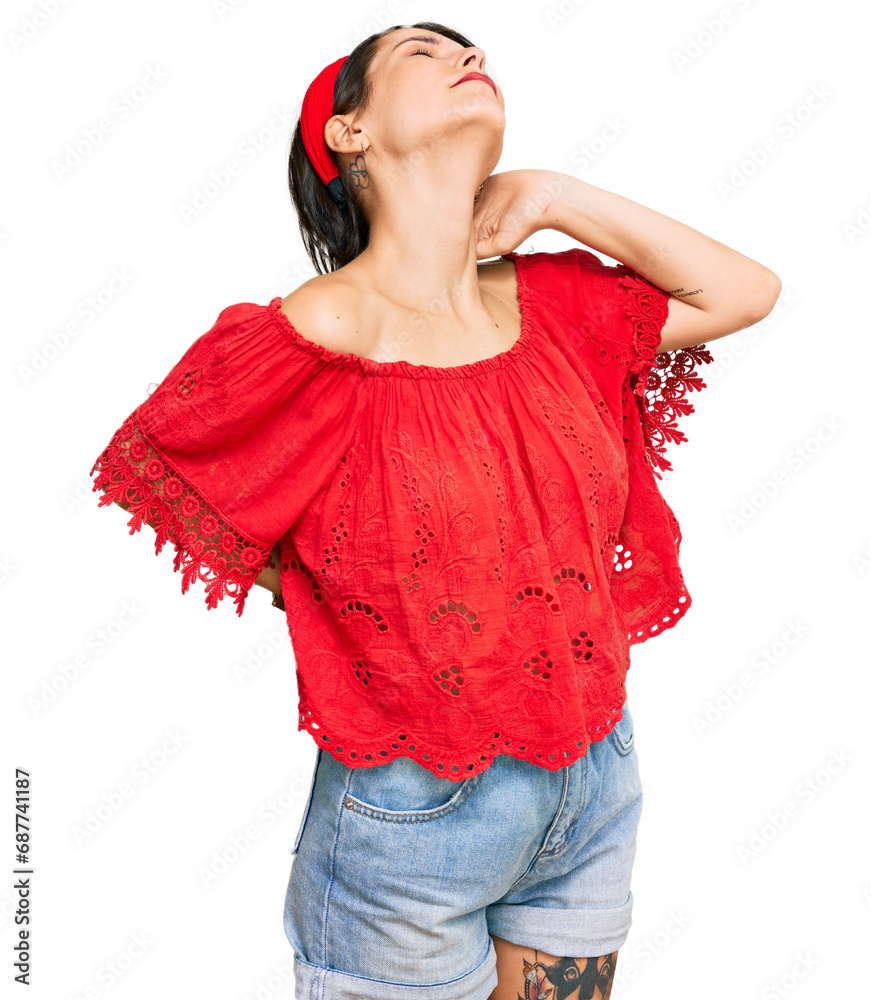 Young brunette woman with short hair wearing casual summer clothes and diadem suffering of neck ache injury, touching neck with hand, muscular pain Young brunette woman with short hair wearing casual summer clothes and diadem suffering of neck ache injury, touching neck with hand, muscular pain