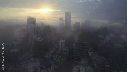 Drone Flight Fog Reveal of Dramatic Seattle Cityscape