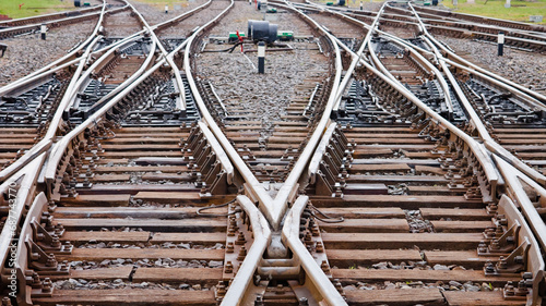 Fotografía railway, in the photo there are railway switches and rails close-up