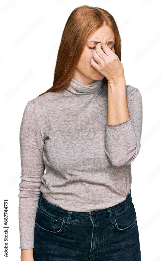 Young irish woman wearing casual clothes tired rubbing nose and eyes feeling fatigue and headache. stress and frustration concept. Young irish woman wearing casual clothes tired rubbing nose and eyes feeling fatigue and headache. stress and frustration concept.