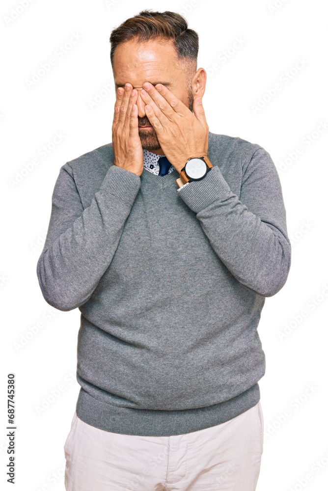 Handsome middle age man wearing business clothes rubbing eyes for fatigue and headache, sleepy and tired expression. vision problem Handsome middle age man wearing business clothes rubbing eyes for fatigue and headache, sleepy and tired expression. vision problem