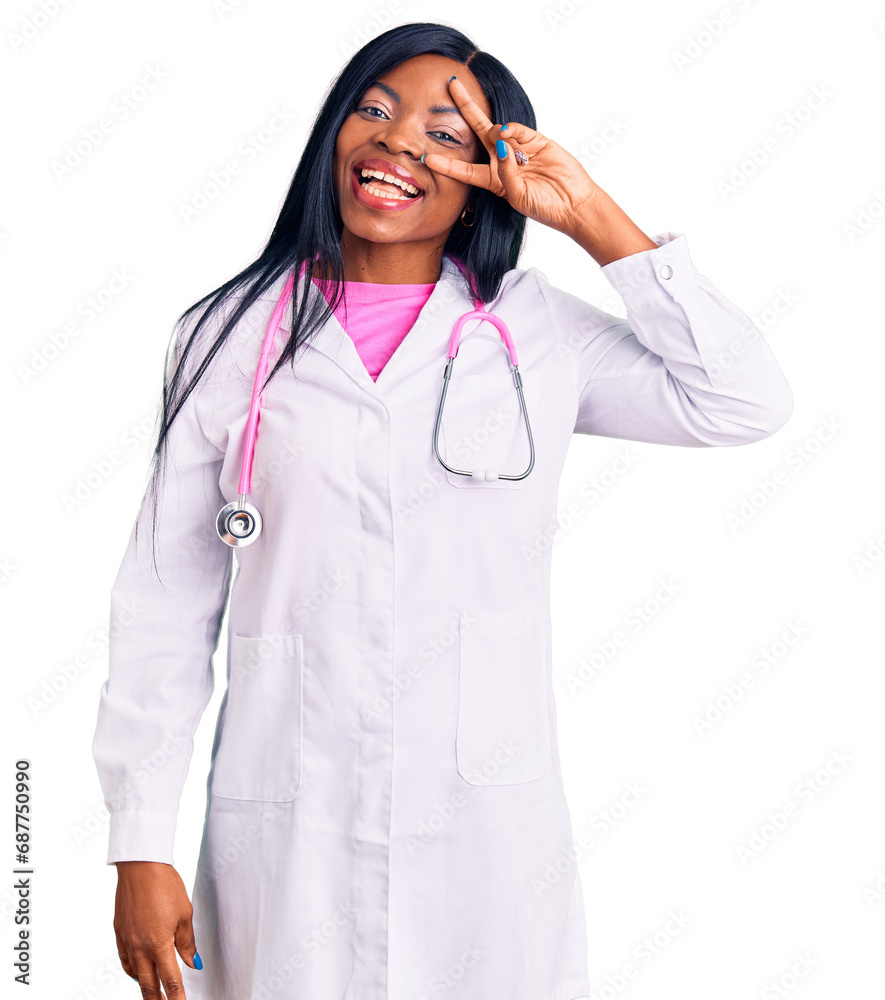 Young african american woman wearing doctor stethoscope doing peace symbol with fingers over face, smiling cheerful showing victory Young african american woman wearing doctor stethoscope doing peace symbol with fingers over face, smiling cheerful showing victory
