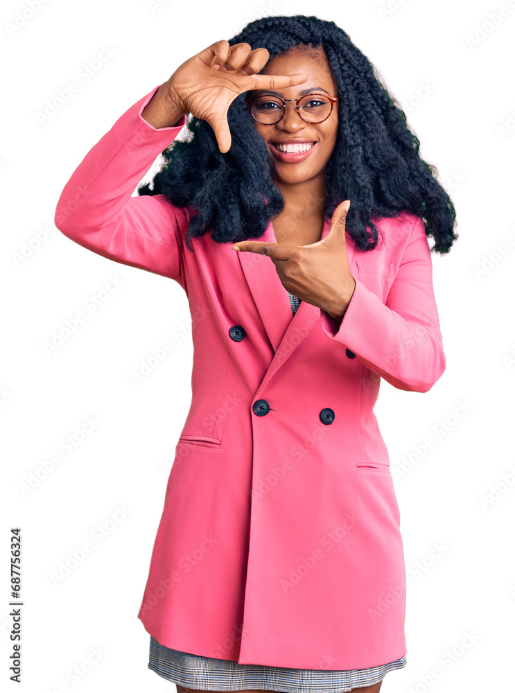 Beautiful african american woman wearing business jacket and glasses smiling making frame with hands and fingers with happy face. creativity and photography concept. Beautiful african american woman wearing business jacket and glasses smiling making frame with hands and fingers with happy face. creativity and photography concept.