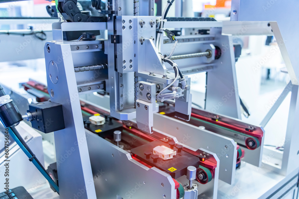 robot arm machine tool at industrial manufacture plant,Smart factory industry 4.0 concept. robot arm machine tool at industrial manufacture plant,Smart factory industry 4.0 concept.