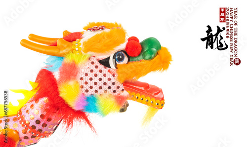 chinese new year concept with hand made dragon isolated on white background,rightside word and seal mean:Chinese calendar for the year,downside seal mean:good bless photo