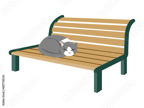 ベンチで丸くなって眠る猫