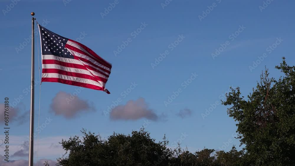 American flag waving with blue sky American flag waving with blue sky
