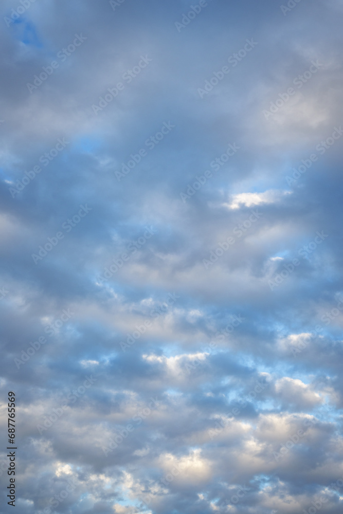 Blue sky with white fluffy cumulus clouds