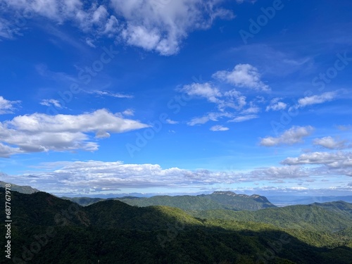 Beautiful landscape scene of mountain and blue sky view. Rest and peaceful vacation concept.