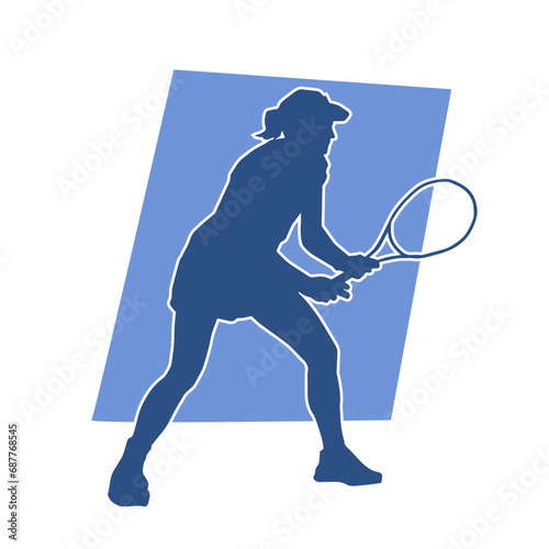 Silhouette of a female tennis sport athlete in action pose. Silhouette of a sporty woman playing tennis sport.