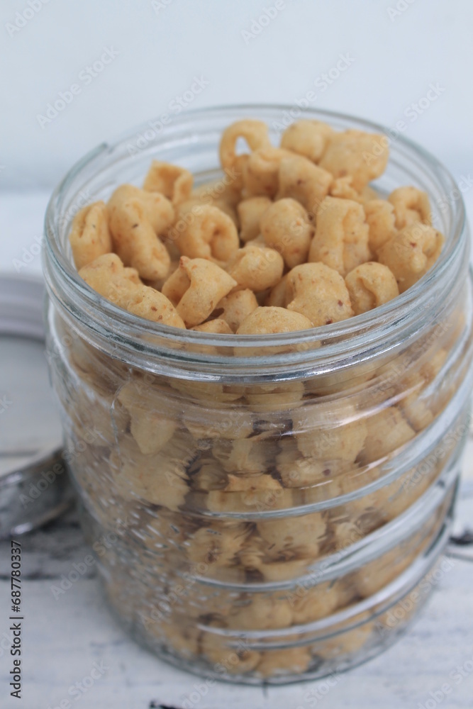 Indonesian snack called potel in a jar on the table Indonesian snack called potel in a jar on the table