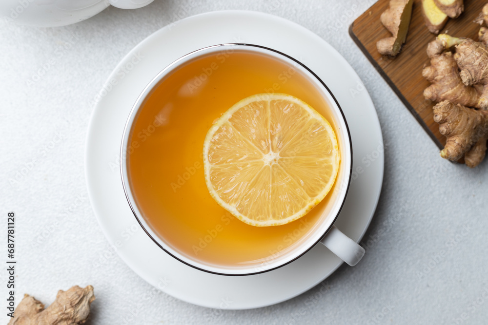 A cup of tea with lemon and ginger and mint A cup of tea with lemon and ginger and mint