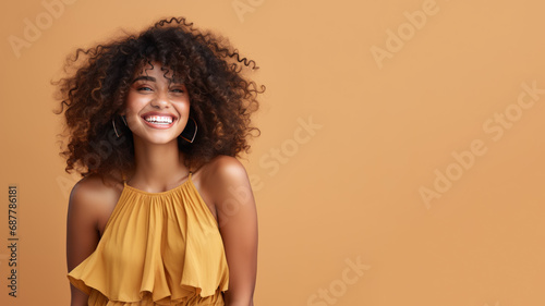 Afro-american woman model wearing a brown sundress isolated on pastel photo