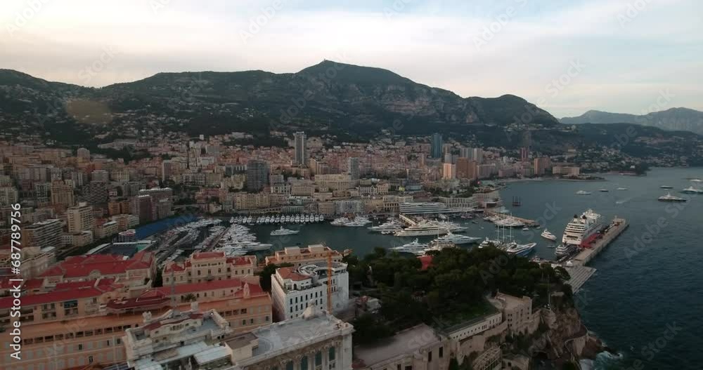 Aerial Shot Of Nautical Vessels At Harbor In City, Drone Flying Backwards Over Sea - Monte Carlo, Monaco Aerial Shot Of Nautical Vessels At Harbor In City, Drone Flying Backwards Over Sea - Monte Carlo, Monaco