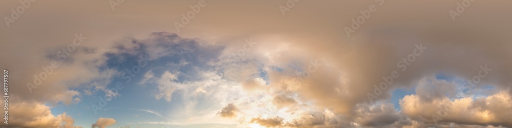Dark blue sunset sky with glowing golden Cumulus clouds in seamless panorama. HDR 360 spherical format for 3D visualization and sky replacement in aerial drone photos.