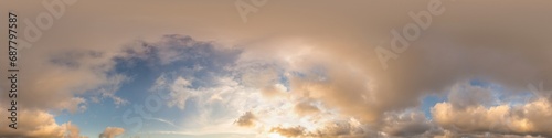 Dark blue sunset sky with glowing golden Cumulus clouds in seamless panorama. HDR 360 spherical format for 3D visualization and sky replacement in aerial drone photos.