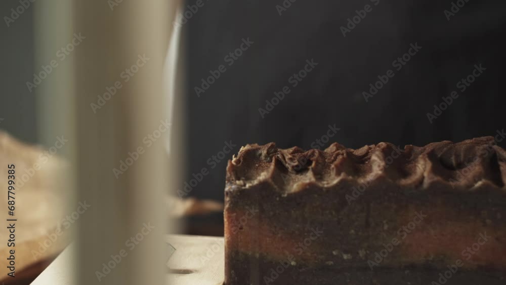 Production of handmade soap in the form of a chocolate cake made from natural oils. Natural cosmetics