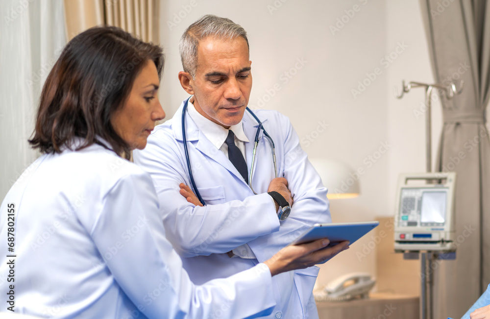 Fototapeta premium Group of professional medical doctor team meeting training medical in uniform working discussing and talk with patients record, teaching medic team, walk in hospital.health medical care concept