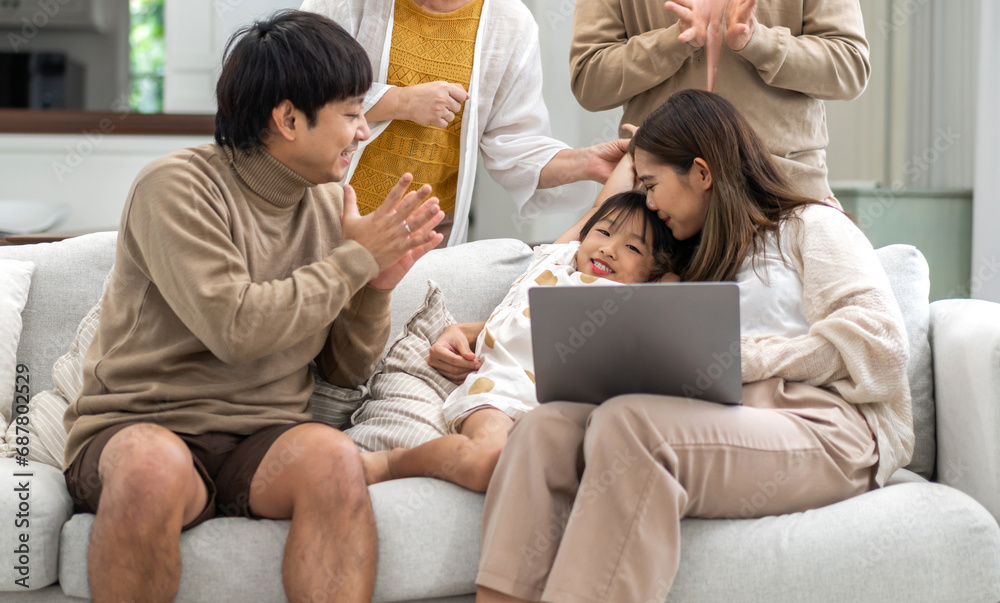 Father and mother with asian kid girl learn on laptop computer reviewing lesson study with online education e-learning.student look for educational knowledge in homeschool at home.Education Father and mother with asian kid girl learn on laptop computer reviewing lesson study with online education e-learning.student look for educational knowledge in homeschool at home.Education