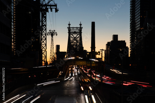 Queensboro Bridge traffic light trails at dawn photo