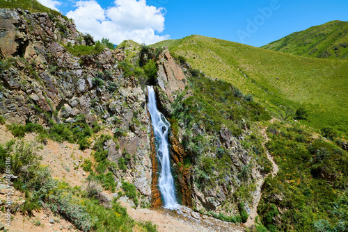 Turgen Bear Waterfall. Turgen Bear Waterfall is located on the territory of the Ile-Alatau National Park. Kazakhstan. Almaty region. Blur effect. photo