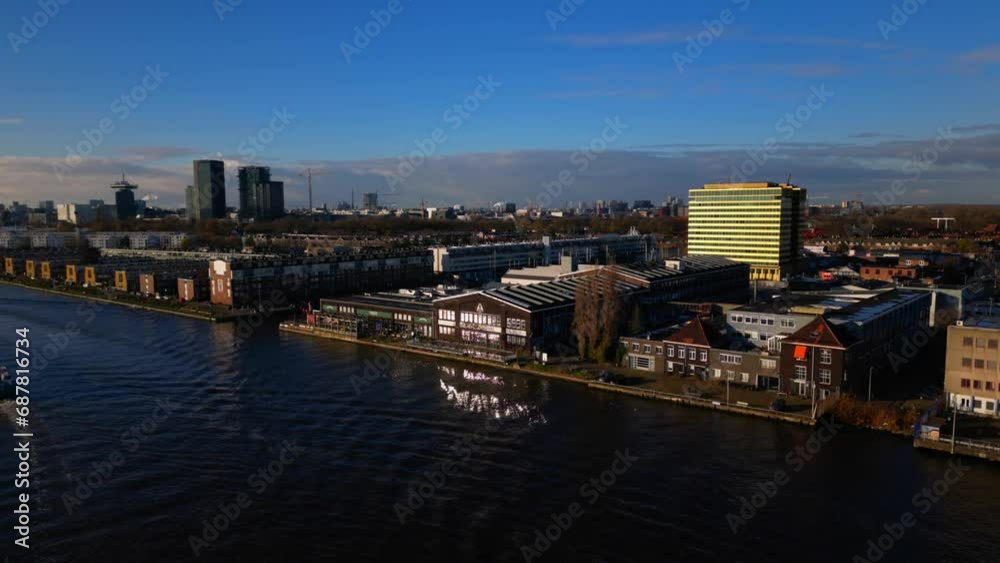 Amsterdam Noord trendy former shipyard district next to river drone crane down Amsterdam Noord trendy former shipyard district next to river drone crane down