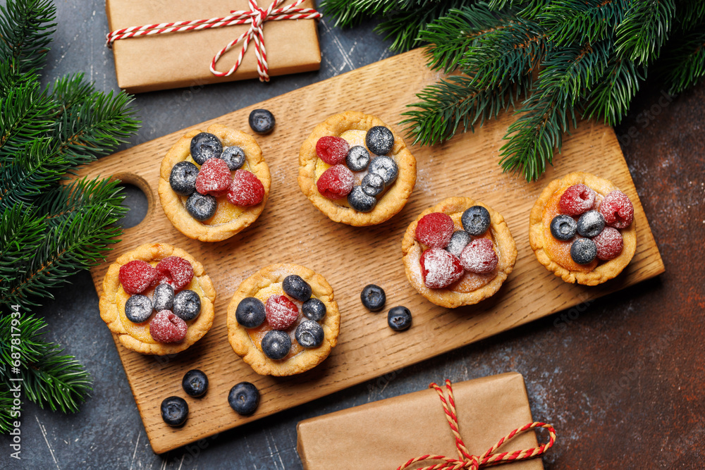 Festive delight: Christmas cupcakes adorned with berries