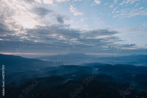 Morning  Sky and Mountains,view of sunrise or sunset over mountain and misty. © artrachen