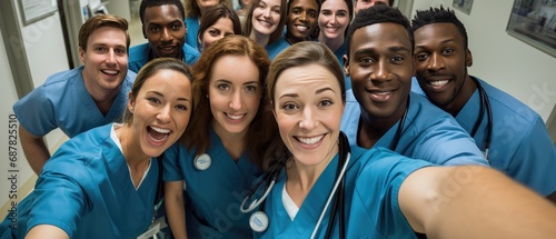 Group of diverse medical professionals taking selfie together. Teamwork and healthcare.