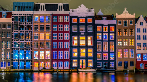 Photography Amsterdam Netherlands canals with lights during evening in December during winte