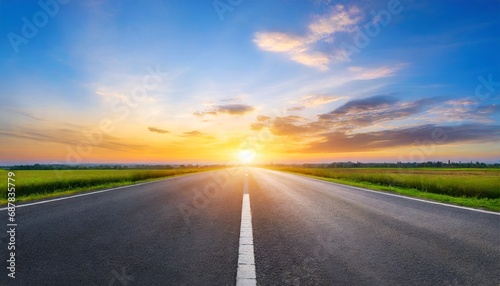 Road to Twilight: Empty Asphalt Path under a Painted Sky