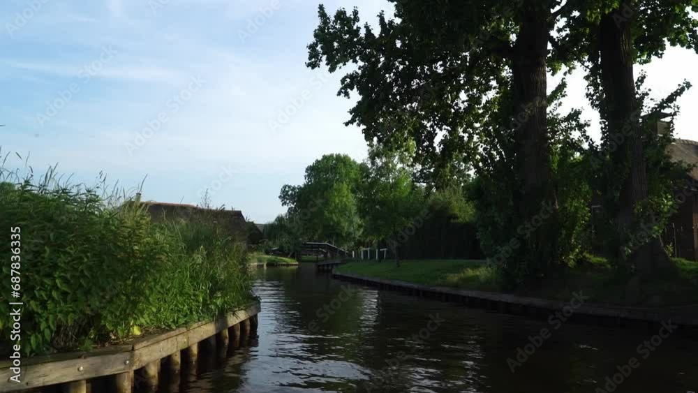 Dutch Canals Over The Giethoorn Village In The Netherlands. POV Dutch Canals Over The Giethoorn Village In The Netherlands. POV