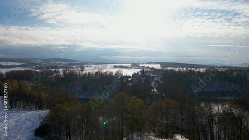 Aerial view of the beautiful Czocha Castle, located in Sucha in Lower Silesia, Poland. The shots were recorded in winter.