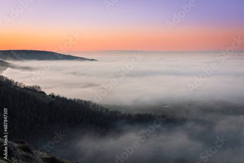 Winter sunset cloud inversion from Butts Brow on the south downs Eastbourne south east England UK