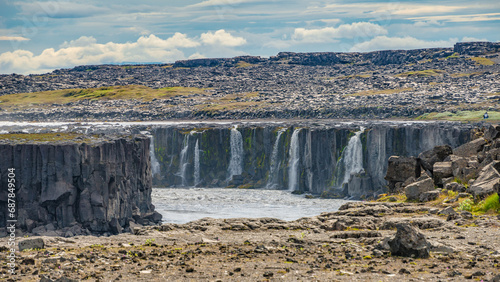 Fototapeta Naklejka Na Ścianę i Meble -  Selfoss, Iceland. The widest waterfall in Iceland Selfoss. Birdview of beautiful Icelandic landscape, huge canyon, and dramatic sky