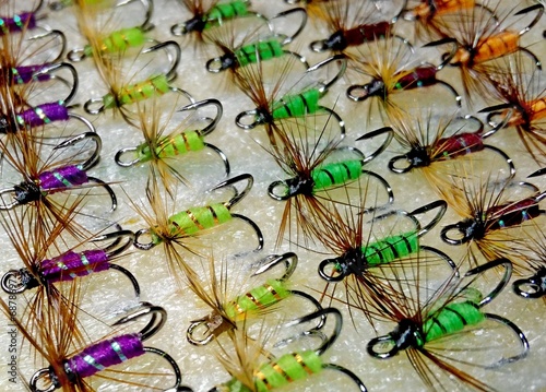 Flies for fly fishing. Fishing hooks. fishing tackle. photo