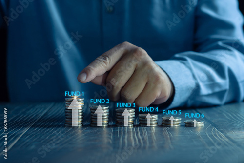 Business planning and strategy concepts Stack of coins with arrow icons and investment funds, stock returns in 2024, new investment plans, financial economic analysis and success strategies.
