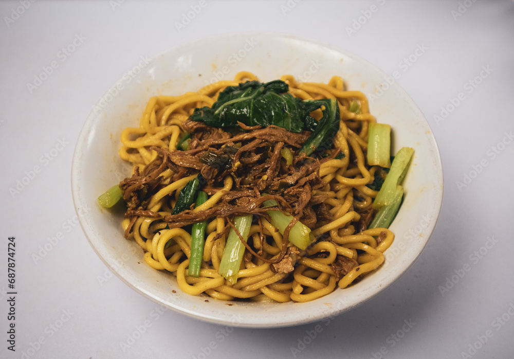 chicken noodles or mie ayam. popular street food in Indonesia